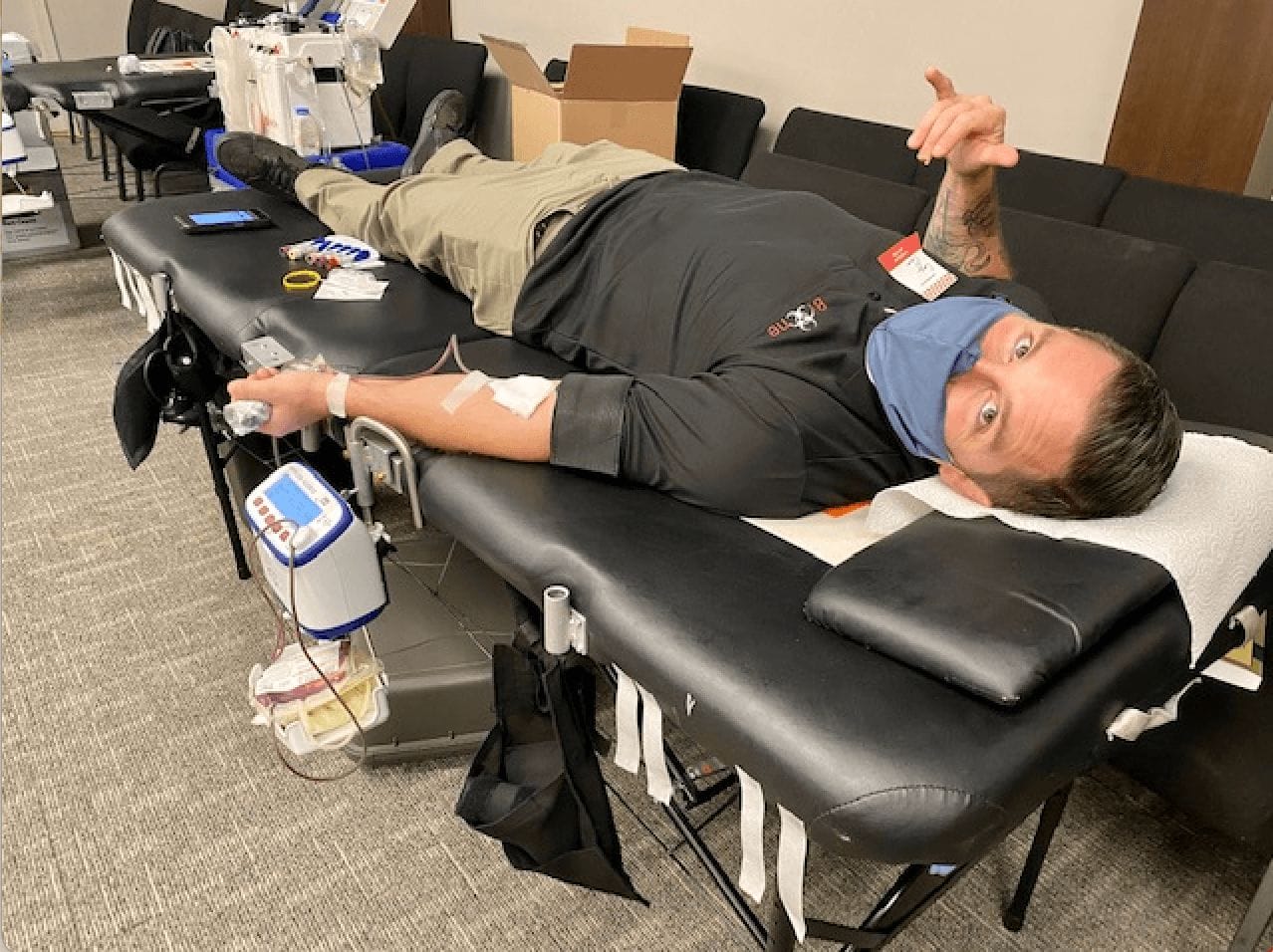 Cory Flores, Bio-One Owner, donating blood in Orange County Cory Flores, Bio-One Owner, donating blood in Orange County